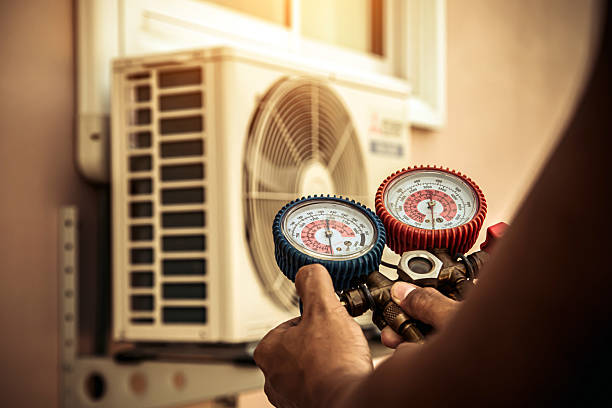 Professional Air Conditioning Service technician working in Cape Girardeau, MO